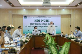 Ủy ban Chứng khoán Nhà nước tổ chức Hội nghị Sơ kết công tác 6 tháng đầu năm và triển khai nhiệm vụ công tác 6 tháng cuối năm 2021, ngày 9/7. (Ảnh: Vietnam+)