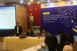 Hội thảo góp ý dự thảo Thông tư hướng dẫn thi hành một số quy định về quản lý thuế, ngày 22/3. (Ảnh: Vietnam+)