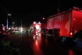 Hiện trường vụ cháy tiệm xe máy. (Ảnh: Nguyễn Thanh/TTXVN)