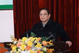 Thủ tướng Phạm Minh Chính động viên, chúc Tết cán bộ, y bác sỹ Bệnh viện Hữu nghị Việt Đức. (Ảnh: Dương Giang/TTXVN)