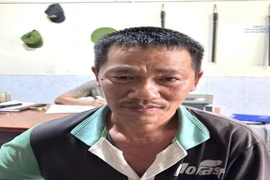 Đối tượng Nguyễn Ngọc Đức, từ đầu năm đến nay đã cho hơn 100 người, chủ yếu là công nhân làm việc tại các Khu công nghiệp trên địa bàn huyện Nhơn Trạch vay với tổng số tiền hơn 400 triệu đồng với lãi suất 121%/năm, thu lợi bất chính hơn 90 đồng. (Ảnh: TTX