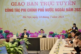 Thứ trưởng Bộ Ngoại giao Hà Kim Ngọc, Chủ nhiệm Ủy ban Công tác về các tổ chức phi chính phủ nước ngoài và Phó Chủ tịch-Tổng Thư ký Liên hiệp các tổ chức hữu nghị Việt Nam Phan Anh Sơn, Phó Chủ nhiệm Ủy ban đồng chủ trì Hội nghị. (Nguồn: Báo Thế giới và V