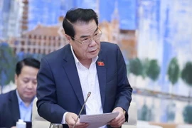Trưởng ban Dân nguyện của Ủy ban Thường vụ Quốc hội Dương Thanh Bình trình bày báo cáo. (Ảnh: Doãn Tấn/TTXVN)