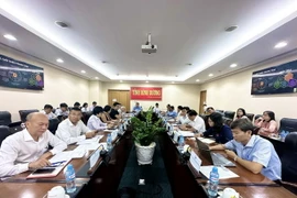 Đoàn công tác Văn phòng Chính phủ làm việc với UBND tỉnh cùng Sở Thông tin và Truyền thông về chọn tỉnh Bình Dương làm đơn vị điểm trong xây dựng Khung bộ chỉ số chỉ đạo, điều hành cấp tỉnh, thành phố. (Ảnh: Chí Tưởng/TTXVN)