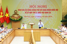 Thủ tướng Phạm Minh Chính, Bí thư Ban Cán sự đảng Chính phủ và Chủ tịch Quốc hội Trần Thanh Mẫn, Bí thư Đảng đoàn Quốc hội đồng chủ trì Hội nghị.(Ảnh: Dương Giang/TTXVN)