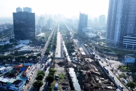 Nút giao Nguyễn Văn Linh - Nguyễn Hữu Thọ (quận 7, Thành phố Hồ Chí Minh) với nhánh hầm chui HC2 (bên trái) đã thông xe. (Ảnh: Hồng Đạt/TTXVN)