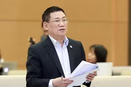 Bộ trưởng Bộ Tài chính Hồ Đức Phớc trình bày tờ trình về việc điều chỉnh dự toán kinh phí bảo đảm hoạt động chưa sử dụng hết năm 2021 của Tổng cục Thuế và Tổng cục Hải quan. (Ảnh: Doãn Tấn/TTXVN)