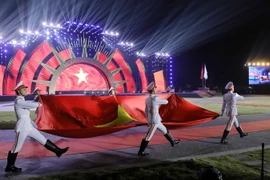 Nghi thức rước Quốc kỳ tại lễ khai mạc. (Ảnh: Trung Kiên/TTXVN)