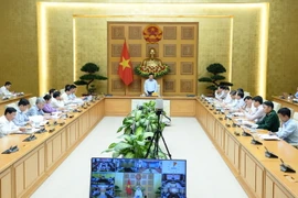 Phó Thủ tướng Thường trực Phạm Bình Minh chủ trì cuộc họp. (Ảnh: Minh Đức/TTXVN)