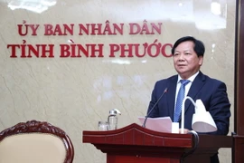 Phó Chủ tịch UBND tỉnh ông Trần Văn Mi phát biểu tại hội nghị. (Ảnh: TTXVN phát)
