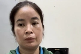 Bà Hà Lê Hồng Phúc tại Cơ quan Công an. (Ảnh: TTXVN phát)