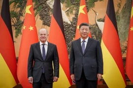 Chủ tịch Trung Quốc Tập Cận Bình (phải) trong cuộc gặp Thủ tướng Đức Olaf Scholz tại Bắc Kinh, ngày 4/11 vừa qua. (Ảnh: AFP/TTXVN)