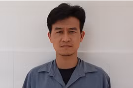 Đối tượng Nguyễn Thành Nguyễn tại cơ quan điều tra. (Ảnh: TTXVN phát)
