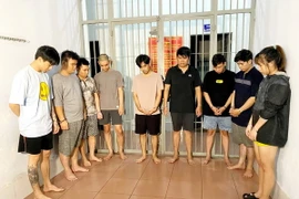 Các bị can tại Cơ quan Công an. (Ảnh: TTXVN phát)