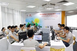 Đội hỗ trợ cuộc thi WhiteHat Grand Prix 2018. (Ảnh: CTV/Vietnam+) 