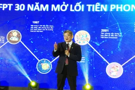 Tổng giám đốc FPT Bùi Quang Ngọc điểm qua 6 lĩnh vực tiên phong của đơn vị này là xuất khẩu phần mềm; internet; giáo dục; phần mềm và giải pháp công nghệ thông tin; báo điên tử; phân phối và bán lẻ. (Ảnh: T.H/Vietnam+)
