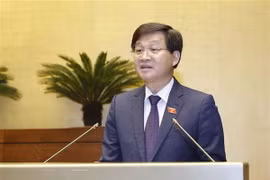 Tổng Thanh tra Chính phủ Lê Minh Khái, thừa ủy quyền của Thủ tướng Chính phủ, trình bày Báo cáo về công tác phòng, chống tham nhũng năm 2018. (Ảnh: Doãn Tấn/TTXVN)
