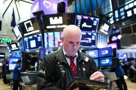 Giao dịch viên tại Sàn giao dịch chứng khoán New York, Mỹ ngày 21/5. (Nguồn: THX/TTXVN)