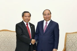 Thủ tướng Nguyễn Xuân Phúc tiếp Bộ trưởng Bộ Khoa học và Công nghệ Lào Boviengkham Vongdara. (Ảnh: Thống Nhất/TTXVN)