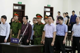 Các bị cáo tại phiên tòa. (Ảnh: Văn Điệp/TTXVN)