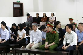 Các bị cáo tại phiên tòa. (Ảnh: Văn Điệp/TTXVN)