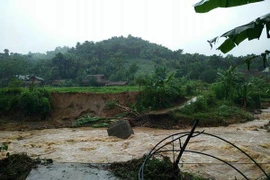 Nước lũ suối Chăn, Lào Cai dâng cao. Ảnh minh họa. (Nguồn: Hương Thu/TTXVN)