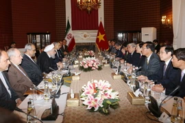 Tổng thống Cộng hoà Hồi giáo Iran, Hassan Rouhani hội đàm với Chủ tịch nước Trương Tấn Sang. (Ảnh: Nguyễn Khang/TTXVN)