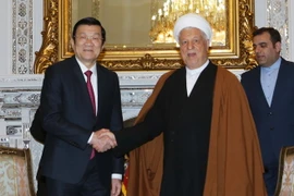 Chủ tịch nước Trương Tấn Sang và Chủ tịch Hội đồng nhận thức Hoà hợp Iran, ngài Hashemi Rafsanjani. (Ảnh: Nguyễn Khang/TTXVN)