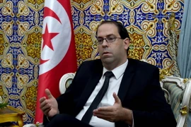 Thủ tướng được chỉ định Youssef Chahed phát biểu tại cuộc họp báo sau khi trình danh sách Chính phủ mới. (Nguồn: AFP/TTXVN)