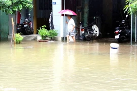 Mưa lớn gây ngập úng nhiều tuyến đường ở thành phố Hà Giang. (Ảnh: Tiến Lâm/TTXVN)