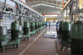 Dây chuyền chế biến cao su ly tâm của Công ty Cao su Dầu Tiến. (Ảnh: Phương Vy/TTXVN)