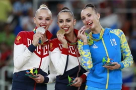 Các vận động viên Nga với niềm vui chiến thắng. (Nguồn: THX/TTXVN)