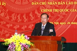Chủ tịch Lào Bounnhang Volachith tại Học viện Chính trị Quốc gia Hồ Chí Minh. (Ảnh: Doãn Tấn/TTXVN)