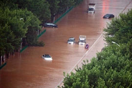 Cảnh ngập lụt do mưa bão tại thành phố Tuyền Châu, tỉnh Phúc Kiến ngày 15/9. (Nguồn: THX/TTXV)