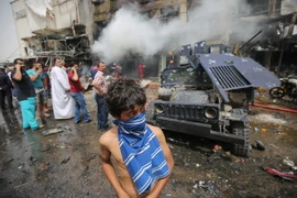 Hiện trường một vụ đánh bom ở Baghdad. (Nguồn: AFP/TTXVN)