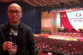 Phóng viên Vũ Hoàng Lân tường thuật lễ khai mạc Đại hội Đảng XII bên trong Hội trường.