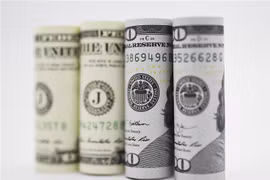 Đồng USD tại một ngân hàng ở Washington, DC. (Ảnh: THX/TTXVN)