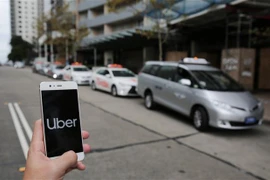 Ứng dụng Uber trên điện thoại di động. (Ảnh: THX/TTXVN)