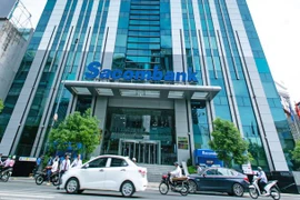 Sacombank lên tiếng về tin đồng Chủ tịch Dương Công Minh bị cấm xuất cảnh. (Ảnh: Vietnam+)
