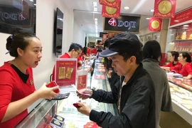 Thêm Công ty SJC tham gia mua vàng từ NHNN bán trực tiếp cho người dân. (Ảnh: Vietnam+)