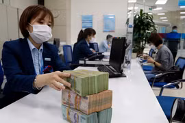 Xu hướng lãi suất huy động tăng lan rộng nhưng vẫn ở mức hợp lý. (Ảnh: Vietnam+)
