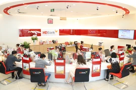 HDBank báo lãi 12.650 tỷ đồng, tăng 46,6% và chia cổ tức 20%. (Ảnh: Vietnam+)