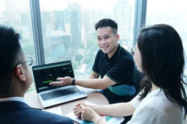 Bốn thành tố để chạy đua bán lẻ trong ngành chứng khoán. (Ảnh: Vietnam+)