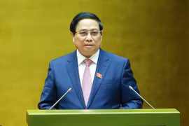 Thủ tướng Phạm Minh Chính báo cáo kết quả thực hiện kế hoạch phát triển kinh tế - xã hội năm 2024, dự kiến kế hoạch phát triển kinh tế-xã hội năm 2025 sáng ngày 21/10. (Ảnh: Dương Giang/TTXVN) 