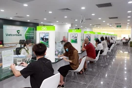 Vietcombank cảnh báo lừa đảo mạo danh nhân viên ngân hàng hỗ trợ sinh trắc học. (Ảnh: Vietnam+)