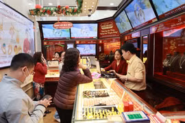 Giá vàng SJC bật tăng mạnh lên gần 82 triệu đồng. (Ảnh: PV/Vietnam+)