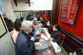 Giá vàng SJC giảm mạnh 600.000 đồng. (Ảnh: PV/Vietnam+)