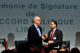 Đại biểu tham dự vòng đối thoại chính trị Libya tại lễ ký kết thỏa thuận hòa bình ở thành phố Skhirat ngày 17/12. (Nguồn: THX/TTXVN) 