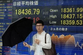 Bảng tỷ giá chứng khoán tại thủ đô Tokyo, Nhật Bản. (Nguồn: AFP/TTXVN)