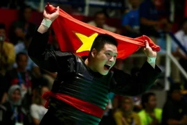 Võ sỹ Nguyễn Văn Trí giành Huy chương Vàng môn Pencak Silat tại ASIAD 2018. (Ảnh: Trọng Tuệ-Phúc Hưng/TTXVN)